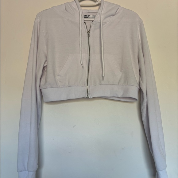 Brand is refuge athletics. Size L. Color is white. - Picture 1 of 2